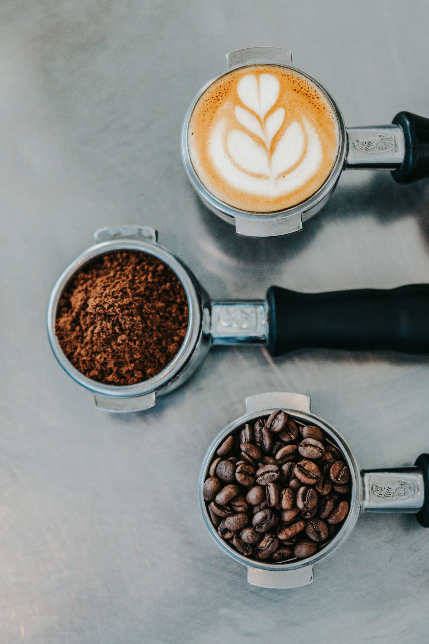 Espresso machine and fresh cups on a kitchen counter in a living space